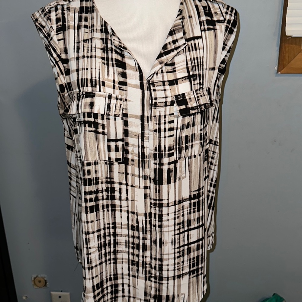 Brown and white tank